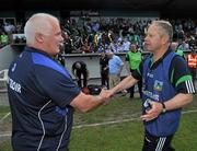 6 June 2010; Limerick manager Mickey Ned O'Sullivan and Waterford manager John Owens shake hands after the match. Munster GAA Football Senior Championship Semi-Final, Waterford v Limerick, Fraher Field, Dungarvan, Co. Waterford. Picture credit: Brian Lawless / SPORTSFILE