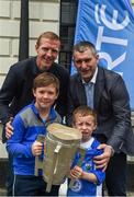 8 May 2016; Billy, front left, age 11, and his brother Tommy Byrne, age 6, holding the Liam MacCarthy cup, from Fore Mile Water, Co. Waterford, with former All-Ireland winner Henry Shefflin and former Tipperary manager Liam Sheedy, pictured at the Launch of RTÉ GAA Championship coverage. Hayes Hotel, Thurles, Co Tipperary. Picture credit: Ray McManus / SPORTSFILE