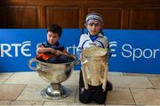 8 May 2016; Nathan Dolan, age 3, from Moate, Co. Westmeath, in the Sam Maguire cup, and Darragh Boland, age 6, from Clonea Power, Co. Waterford, with the Liam MacCarthy cup, pictured at the Launch of RTÉ GAA Championship coverage. Hayes Hotel, Thurles, Co Tipperary. Picture credit: Ray McManus / SPORTSFILE