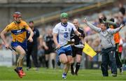 8 May 2016; Tom Devine of Waterford in action against Darach Honan of Clare, as Clare manager Davy Fitzgerald looks on during the Allianz Hurling League, Division 1 Final - Replay, Clare v Waterford, at Semple Stadium, Thurles, Tipperary. Picture credit: Piaras Ó Mídheach / SPORTSFILE