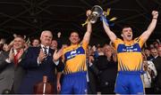 8 May 2016; Seán McGrath, left, CEO, Allianz Ireland, and Uachtarán Chumann Lúthchleas Gael Aogán Ó Fearghail look on as joint Clare captains Cian Dillon and Tony Kelly, right, lift the cup after the Allianz Hurling League, Division 1 Final - Replay, Clare v Waterford at Semple Stadium, Thurles, Tipperary. Picture credit: Ray McManus / SPORTSFILE