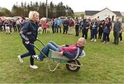 8 May 2016; Eileen O'Connor and Patsy O'Connor competing in the wheelbarrow race during the Piarsaigh Na Dromoda Lá na gClubanna celebrations. Lá Na gClubanna - Piarsaigh Na Dromoda. Páirc an Phiarsaigh, Inse na Toinne, Dromid, Co. Kerry. Picture credit: Diarmuid Greene / SPORTSFILE