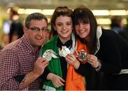 8 May 2016; Nicole Turner, from Portarlington, Co. Laois, who won two silver medals and one bronze medal, and also secured nine personal best times over the course of the seven-day competition, is greeted by her parnets Jason and Bernie on her return to Dublin Airport from the IPC European Open Swim Championships in Funchal, Portugal. The squad collected two European silver medals, one bronze medal and a whopping 23 Personal Best times. Picture credit: Stephen McCarthy / SPORTSFILE