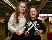 8 May 2016; Nicole Turner, from Portarlington, Co. Laois, who won two silver medals and one bronze medal, and also secured nine personal best times over the course of the seven-day competition, is greeted by her friend Amy Kelly on her return to Dublin Airport from the IPC European Open Swim Championships in Funchal, Portugal. The squad collected two European silver medals, one bronze medal and a whopping 23 Personal Best times. Picture credit: Stephen McCarthy / SPORTSFILE