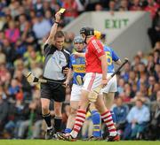 30 May 2010; Eoin Kelly, Tipperary, is shown a yellow card by referee Barry Kelly. Munster GAA Hurling Senior Championship Quarter-Final, Cork v Tipperary, Pairc Ui Chaoimh, Cork. Picture credit: Ray McManus / SPORTSFILE