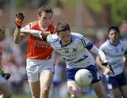 6 June 2010; Conor McManus, Monaghan, in action against Brendan Donaghy, Armagh. Ulster GAA Football Senior Championship Quarter-Final, Monaghan v Armagh, Casement Park, Belfast, Co. Antrim. Picture credit: Oliver McVeigh / SPORTSFILE