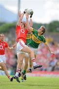 6 June 2010; Aidan Walsh, Cork, contests a ball with Micheal Quirke and Donnchadh Walsh, Kerry. Munster GAA Football Senior Championship Semi-Final, Kerry v Cork, Fitzgerald Stadium, Killarney, Co. Kerry. Picture credit: Brendan Moran / SPORTSFILE
