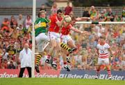 6 June 2010; Graham Canty, supported by Fintan Goold, Cork, in action against Kieran Donaghy, Kerry. Munster GAA Football Senior Championship Semi-Final, Kerry v Cork, Fitzgerald Stadium, Killarney, Co. Kerry. Picture credit: Diarmuid Greene / SPORTSFILE