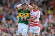 6 June 2010; Kerry's Kieran Donaghy reacts to missing a chance of a goal during the first half as Cork goalkeeper Alan Quirke passes by. Munster GAA Football Senior Championship Semi-Final, Kerry v Cork, Fitzgerald Stadium, Killarney, Co. Kerry. Picture credit: Brendan Moran / SPORTSFILE