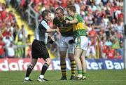 6 June 2010; Kerry's Kieran Donaghy, left, and Colm Cooper argue a decision with referee Padraig Hughes. Munster GAA Football Senior Championship Semi-Final, Kerry v Cork, Fitzgerald Stadium, Killarney, Co. Kerry. Picture credit: Diarmuid Greene / SPORTSFILE