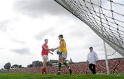 6 June 2010; Cork's Colm O'neill and Kerry goalkeeper brendan Kealy shake hands after the final whistle of normal time. Munster GAA Football Senior Championship Semi-Final, Kerry v Cork, Fitzgerald Stadium, Killarney, Co. Kerry. Picture credit: Brendan Moran / SPORTSFILE