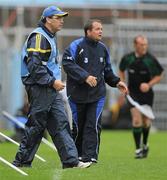 7 June 2010; Managers Ger O'Loughlin, left, of Clare, and Davy Fitzgerald of Waterford walk the sideline during the game. Munster GAA Hurling Senior Championship Semi-Final, Waterford v Clare, Semple Stadium, Thurles, Co. Tipperary. Picture credit: Brendan Moran / SPORTSFILE