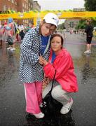 7 June 2010; Saibh Cuddy, left, and Grace Buckley, from St Michael's House, after completing the 2010 Dublin Womens Mini Marathon. 2010 Dublin Womens Mini Marathon, Dublin City. Picture credit: Barry Cregg / SPORTSFILE