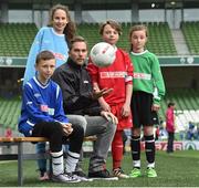 11 May 2016; SPAR FAI Primary School 5s Programme ambassador and former Republic of Ireland International Jason McAteer was at the AVIVA Stadium to watch the SPAR FAI Primary School 5s National Finals where 192 girls and boys from 24 schools battled it out for national honours. The 2016 SPAR FAI Primary School 5s Programme was the biggest yet as almost 24,000 children from 1,267 schools took part in county, regional and provincial blitzes nationwide. For further information please see www.spar.ie or www.faischools.ie Pictured was Jason McAteer with some of the children who took part, from left, Jamie McCoy, from Carns, NS, Gurteen, Co. Sligo, Bea Drummond, from Ardnagrath, NS, Athlone, Co. Westmeath, Cian Fitzgerald, from Croom, NS, Co. Limerick, and Bonnie McKiernan, from Scoil Mhuire, Lacken, Co. Cavan. Aviva Stadium, Dublin. Picture credit: Matt Browne / SPORTSFILE