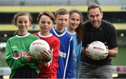 11 May 2016; SPAR FAI Primary School 5s Programme ambassador and former Republic of Ireland International Jason McAteer was at the AVIVA Stadium to watch the SPAR FAI Primary School 5s National Finals where 192 girls and boys from 24 schools battled it out for national honours. The 2016 SPAR FAI Primary School 5s Programme was the biggest yet as almost 24,000 children from 1,267 schools took part in county, regional and provincial blitzes nationwide. For further information please see www.spar.ie or www.faischools.ie. Pictured was Jason McAteer with some of the children who took part, from left, Bonnie McKiernan, from Scoil Mhuire, Lacken, Co. Cavan, Cian Fitzgerald, from Croom, NS, Co. Limerick, Jamie McCoy, from Carn, NS, Gurteen, Co. Sligo, Bea Drummond, from Ardnagrath, NS, Athlone, Co. Westmeath. Aviva Stadium, Dublin. Picture credit: Matt Browne / SPORTSFILE