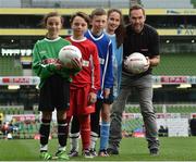 11 May 2016; SPAR FAI Primary School 5s Programme ambassador and former Republic of Ireland International Jason McAteer was at the AVIVA Stadium to watch the SPAR FAI Primary School 5s National Finals where 192 girls and boys from 24 schools battled it out for national honours. The 2016 SPAR FAI Primary School 5s Programme was the biggest yet as almost 24,000 children from 1,267 schools took part in county, regional and provincial blitzes nationwide. For further information please see www.spar.ie or www.faischools.ie. Pictured was Jason McAteer with some of the children who took part, from left, Bonnie McKiernan, from Scoil Mhuire, Lacken, Co. Cavan, Cian Fitzgerald, from Croom, NS, Co. Limerick, Jamie McCoy, from Carn, NS, Gurteen, Co. Sligo, Bea Drummond, from Ardnagrath, NS, Athlone, Co. Westmeath. Aviva Stadium, Dublin. Picture credit: Matt Browne / SPORTSFILE