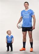 12 May 2016; AIG Insurance officially launched the new Dublin GAA jersey today. Available at oneills.com and at sports outlets nationwide for €65, the jersey will be worn for the first time in a game by the Dublin minor hurlers on Saturday against Kilkenny. Pictured in the new jersey are Dublin footballer Denis Bastick and his son Aidan. Parnell Park, Dublin. Picture credit: Stephen McCarthy / SPORTSFILE