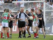5 June 2010; Donal Vaughan, Mayo, disputes a decision with referee Jimmy White. Connacht GAA Football Senior Championship Quarter-Final, Sligo v Mayo, Markievicz Park, Sligo. Picture credit: Oliver McVeigh / SPORTSFILE