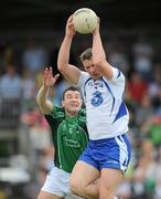 6 June 2010; Gary Hurney, Waterford, in action against Stephen Lucey, Limerick. Munster GAA Football Senior Championship Semi-Final, Waterford v Limerick, Fraher Field, Dungarvan, Co. Waterford. Picture credit: Brian Lawless / SPORTSFILE