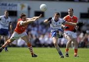 6 June 2010; Tomas Freeman, Monaghan, in action against Brendan Donaghy, Armagh. Ulster GAA Football Senior Championship Quarter-Final, Monaghan v Armagh, Casement Park, Belfast, Co. Antrim. Picture credit: Oliver McVeigh / SPORTSFILE