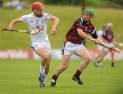5 June 2010; Mark Moloney, Kildare, in action against Andrew Mitchell, Westmeath. Christy Ring Cup Semi-Final, Kildare v Westmeath, Pairc Tailteann, Navan, Co. Meath. Picture credit: Barry Cregg / SPORTSFILE
