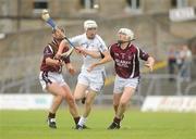 5 June 2010; Paul Fitzgerald, Kildare, in action against Darren McCormack, left, and John Shaw, Westmeath. Christy Ring Cup Semi-Final, Kildare v Westmeath, Pairc Tailteann, Navan, Co. Meath. Picture credit: Barry Cregg / SPORTSFILE