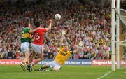 6 June 2010; Paul Kerrigan, Cork, scores a point despite the attention of Kerry's Marc O Se and goalkeeper Alan Quirke. Munster GAA Football Senior Championship Semi-Final, Kerry v Cork, Fitzgerald Stadium, Killarney, Co. Kerry. Picture credit: Stephen McCarthy / SPORTSFILE