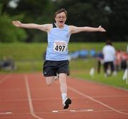 10 June 2010; Adam Lalor, from Clonee, Co. Meath, celebrates during his athletics divisioning event at the 2010 Special Olympics Ireland Games. University of Limerick, Limerick. Picture credit: Stephen McCarthy / SPORTSFILE