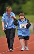 10 June 2010; Colette Downey, from Santry, Dublin, with her assistant Esther Gilligan during the athletics divisioning events at the 2010 Special Olympics Ireland Games. University of Limerick, Limerick. Picture credit: Stephen McCarthy / SPORTSFILE