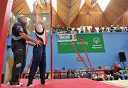 10 June 2010; Conrad McCullough, from Ennis, Co. Clare, is assisted by his father and Munster coach Brendan McCullough, as he competes on the rings during the 2010 Special Olympics Ireland Games. University of Limerick, Limerick. Picture credit: Diarmuid Greene / SPORTSFILE
