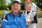 11 June 2010; George Hamilton, from Faythe, Wexford, age 76, who is the oldest competing athlete, and competed in the Pitch & Putt, with Meg Carr, from Letterkenny, Co. Donegal, age 9, who is the youngest competing athlete and won 5 gold medals and 1 silver medal in Gymnastics, at the second day of the 2010 Special Olympics Ireland Games. University of Limerick, Limerick. Picture credit: Stephen McCarthy / SPORTSFILE