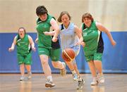 11 June 2010; Vanessa Walsh, from Clane, Co. Kildare, in action against Ann Coen, from Galway, left, and Joan Carden, from Ballina, Co. Mayo, right, during the Womens Basketball event on the second day of the 2010 Special Olympics Ireland Games. University of Limerick, Limerick. Picture credit: Diarmuid Greene / SPORTSFILE