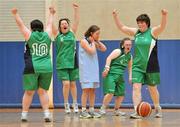 11 June 2010; Connaught players, from left to right, Una O'Malley, 10, from Ballina, Co. Mayo, Caroline McDonagh, 5, from Galway, Orla Carpenter, 4, from Mullingar, Co. Westmeath, and Ann Coen, 9, from Galway, celebrate at the final whistle after victory over Eastern Region as Vanessa Walsh, from Clane, Co. Kildare, shows her disappointment. Womens Basketball, day 2, 2010 Special Olympics Ireland Games. University of Limerick, Limerick. Picture credit: Diarmuid Greene / SPORTSFILE