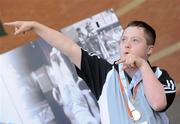 11 June 2010; Liam Ross, from Banbridge, Co. Down, after recieving his gold medal for Soft Ball during the second day of the 2010 Special Olympics Ireland Games. University of Limerick, Limerick. Picture credit: Stephen McCarthy / SPORTSFILE