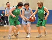 11 June 2010; Jane Murphy, from Navan Road, Dublin, Eastern Region, in action against Ann Coen, from Galway, left, and Linda Cully, from Mullingar, Co. Westmeath, Connaught, during the Womens Basketball during the second day of the 2010 Special Olympics Ireland Games. University of Limerick, Limerick. Picture credit: Diarmuid Greene / SPORTSFILE