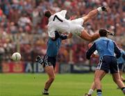 7 June 1998; Ian Robertson of Dublin in action against Anthony Rainbow of Kildare during the Leinster Senior Football Championship Quarter-Final match between Dublin and Kildare at Croke Park in Dublin. Photo by David Maher/Sportsfile