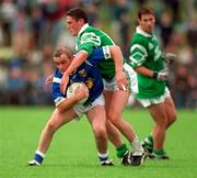 7 June 1998; Bernard Morris of Cavan is tackled by John Hanna of Fermanagh during the Ulster Football Championship Quarter Final match between Cavan and Fermanagh at Breffni Park in Cavan. Photo by Matt Browne/Sportsfile