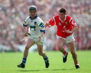 17 May 1998, Dave Bennett of Waterford in action against Mark Landers of Cork during the National GAA Hurling League Final match between Cork and Waterford at Semple Stadium in Thurles, Co Tipperary. Photo by Ray McManus/Sportsfile