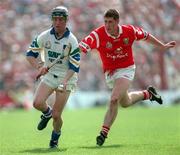 17 May 1998, Dave Bennett of Waterford in action against Mark Landers of Cork during the National GAA Hurling League Final match between Cork and Waterford at Semple Stadium in Thurles, Co Tipperary. Photo by Ray McManus/Sportsfile