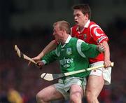 31 May 1998; Dave Clarke of Limerick in action against Alan Browne of Cork during the Munster Senior Hurling Championship Quarter-Final match between Limerick and Cork at the Gaelic Grounds in Limerick. Photo by Ray McManus/Sportsfile