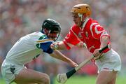 17 May 1998, Joe Deane of Cork in action against Tom Feeney of Waterford during the National GAA Hurling League Final match between Cork and Waterford at Semple Stadium in Thurles, Co Tipperary. Photo by Ray McManus/Sportsfile