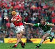 31 May 1998; Joe Deane of Cork is tackled by Stephen McDonagh of Limerick during the Munster Senior Hurling Championship Quarter-Final match between Limerick and Cork at the Gaelic Grounds in Limerick. Photo by Ray McManus/Sportsfile
