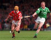 31 May 1998; Joe Deane of Cork in action against Stephen McDonagh of Limerick during the Munster Senior Hurling Championship Quarter-Final match between Limerick and Cork at the Gaelic Grounds in Limerick. Photo by Ray McManus/Sportsfile
