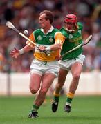 24 May 1998; Joe Dooley of Offaly in action against Joe O'Loughlin of Meath during the Leinster GAA Senior Hurling Championship Quarter-Final match between Offaly and Meath at Croke Park in Dublin. Photo by Ray McManus/Sportsfile