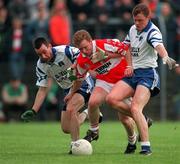 31 May 1998; Kieran McKeever of Derry in action against Peter Duffy, left, and Cyril Ronaghan of Monaghan during the Ulster GAA Football Senior Championship Quarter-Final match between Derry and Monaghan at Celtic Park in Derry. Photo by David Maher/Sportsfile