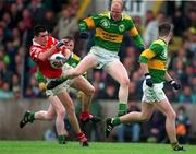 4 May 1997; Cork's Martin Cronin is tackled by Kerry's Liam Flaherty. National League Football Final, Kerry v Cork, Páirc U’ Chaoimh, Cork. Picture Credit: Ray McManus / SPORTSFILE.
