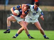 30 May 1998; Michael Spillane of Tipperary is tackled by Jason Crotty of Waterford during the Munster Senior Football Championship Second Round match between Tipperary and Waterford at Ned Hall Park in Clonmel. Photo by Ray McManus/Sportsfile