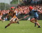31 May 1998; Niall Moloney of Kilkenny gets away from Sean Power of Dublin during the Leinster GAA Hurling Senior Championship Quarter-Final match between Dublin and Kilkenny at Parnell Park in Dublin. Photo by Brendan Moran/Sportsfile
