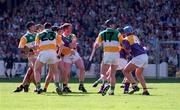 14 June 1998; Johnny Dooley, extreme left, of Offaly wtaches his shot hit the back of the Wexford net for what proved the winning goal during the Leinster Senior Hurling Championship Semi-Final match between Offaly and Wexford at Croke Park in Dublin. Photo by Ray McManus/Sportsfile