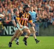 31 May 1998; P.J Delaney of Kilkenny gets away from David Sweeney of Dublin during the Leinster GAA Hurling Senior Championship Quarter-Final match between Dublin and Kilkenny at Parnell Park in Dublin. Photo by Brendan Moran/Sportsfile